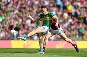 24 July 2022; Paudie Clifford of Kerry shoots for goal despite the attempts of Jack Glynn of Galway during the GAA Football All-Ireland Senior Championship Final match between Kerry and Galway at Croke Park in Dublin. Photo by Brendan Moran/Sportsfile