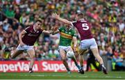 24 July 2022; Paudie Clifford of Kerry scores a point despite the attempts of Matthew Tierney, left, and Dylan McHugh of Galway during the GAA Football All-Ireland Senior Championship Final match between Kerry and Galway at Croke Park in Dublin. Photo by Brendan Moran/Sportsfile