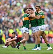 24 July 2022; Kerry players, from left, Tom O'Sullivan, Paudie Clifford and Stefan Okunbor celebrate after their side's victory in the GAA Football All-Ireland Senior Championship Final match between Kerry and Galway at Croke Park in Dublin. Photo by Piaras Ó Mídheach/Sportsfile