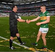 24 July 2022; Referee Seán Hurson presents the match ball to Seán O'Shea of Kerry after the GAA Football All-Ireland Senior Championship Final match between Kerry and Galway at Croke Park in Dublin. Photo by Ramsey Cardy/Sportsfile