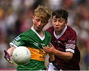24 July 2022; Danann Glynn, Lisnagry N.S., Lisnagry, Limerick, representing Kerry in action against Oran Kenny, St Saran's N.S., Belmont, Birr, Offaly, representing Galway during the INTO Cumann na mBunscol GAA Respect Exhibition Go Games at GAA All-Ireland Senior Football Championship Final match between Kerry and Galway at Croke Park in Dublin. Photo by Harry Murphy/Sportsfile
