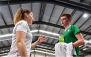 25 July 2022; Dylan Noble of Team Ireland speaking with Team Ireland coach Chloe Magee during the mens singles badminton match against Romeo Makboul of Sweden during day one of the 2022 European Youth Summer Olympic Festival at Banská Bystrica, Slovakia. Photo by Eóin Noonan/Sportsfile