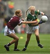 24 July 2022; Chloe Clarke, Newcastle, Tipperary, representing Kerry in action against Aine McCullagh, Queen of the Universe N.S., Bagenalstown, Carlow, representing Galway during the INTO Cumann na mBunscol GAA Respect Exhibition Go Games at GAA All-Ireland Senior Football Championship Final match between Kerry and Galway at Croke Park in Dublin. Photo by David Fitzgerald/Sportsfile