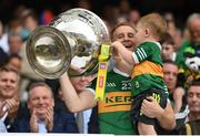 24 July 2022; Gavin Crowley of Kerry and his son Arlo lift the Sam Maguire Cup after the GAA Football All-Ireland Senior Championship Final match between Kerry and Galway at Croke Park in Dublin. Photo by Stephen McCarthy/Sportsfile