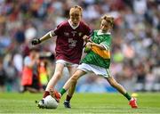 24 July 2022; Oisín Treacy, St Canices Co Ed, Granges Rd, Kilkenny, representing Galway, and Ruairí Collins, St Joseph’s PS, Bessbrook, Armagh, representing Kerry, during the INTO Cumann na mBunscol GAA Respect Exhibition Go Games at GAA All-Ireland Senior Football Championship Final match between Kerry and Galway at Croke Park in Dublin. Photo by Stephen McCarthy/Sportsfile