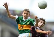 24 July 2022; Ruairí Collins, St Joseph’s PS, Bessbrook, Armagh, representing Kerry, and Josh Furlong, Scoil Naomh Íosaf, Baltinglass, Wicklow, representing Galway, during the INTO Cumann na mBunscol GAA Respect Exhibition Go Games at GAA All-Ireland Senior Football Championship Final match between Kerry and Galway at Croke Park in Dublin. Photo by Stephen McCarthy/Sportsfile