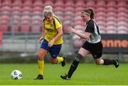 24 July 2022; Ciara Desmond of Douglas Hall in action against Helen Cooney of Whitehall Rangers during the FAI Women’s Intermediate Cup Final 2022 match between Douglas Hall LFC and Whitehall Rangers at Turners Cross in Cork. Photo by Michael P Ryan/Sportsfile