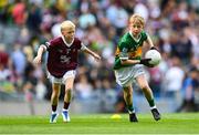 24 July 2022; Danann Glynn, Lisnagry N.S., Lisnagry, Limerick, representing Kerry, and Myles Nelligan, St. Joseph's N.S., Ballyadams, Laois, representing Galway, during the INTO Cumann na mBunscol GAA Respect Exhibition Go Games at GAA All-Ireland Senior Football Championship Final match between Kerry and Galway at Croke Park in Dublin. Photo by Stephen McCarthy/Sportsfile