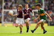 24 July 2022; Seán Óg McDonagh, Holy Family N.S., Tubbercurry, Sligo, representing Galway, is tackled by Donnacha Malone, Scoil Mhuire, Glenties, Donegal, representing Kerry, during the INTO Cumann na mBunscol GAA Respect Exhibition Go Games at GAA All-Ireland Senior Football Championship Final match between Kerry and Galway at Croke Park in Dublin. Photo by Ray McManus/Sportsfile