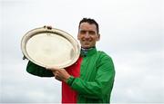 25 July 2022; Patrick Mullins with the plate after riding Echoes In Rain to win the Connacht Hotel Handicap during day one of the Galway Races Summer Festival at Ballybrit Racecourse in Galway. Photo by Harry Murphy/Sportsfile