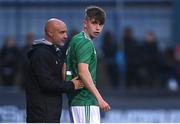 25 July 2022; Eoin Kenny of Northern Ireland speaks with Northern Ireland manager Gerard Lyttle as he prepares to come on as a second half substitute during the SuperCupNI match between Northern Ireland and Manchester United at Coleraine Showgrounds in Coleraine, Derry. Photo by Ramsey Cardy/Sportsfile