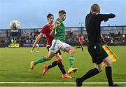 25 July 2022; Eoin Kenny of Northern Ireland in action against Louis Jackson of Manchester United during the SuperCupNI match between Northern Ireland and Manchester United at Coleraine Showgrounds in Coleraine, Derry. Photo by Ramsey Cardy/Sportsfile