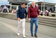 26 July 2022; Galway footballer Paul Conroy arrives with Thomas Hughes before racing on day two of the Galway Races Summer Festival at Ballybrit Racecourse in Galway. Photo by Harry Murphy/Sportsfile