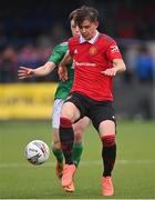 25 July 2022; Louis Jackson of Manchester United in action against Sam Glenfield of Northern Ireland during the SuperCupNI match between Northern Ireland and Manchester United at Coleraine Showgrounds in Coleraine, Derry. Photo by Ramsey Cardy/Sportsfile