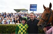 26 July 2022; Jockey Chris Hayes and trainer Brian Duffy after sending out Magic Chegaga to win the Colm Quinn BMW Mile Handicap during day two of the Galway Races Summer Festival at Ballybrit Racecourse in Galway. Photo by Harry Murphy/Sportsfile