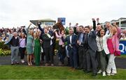 26 July 2022; Jockey Chris Hayes and winning connections after sending out Magic Chegaga to win the Colm Quinn BMW Mile Handicap during day two of the Galway Races Summer Festival at Ballybrit Racecourse in Galway. Photo by Harry Murphy/Sportsfile