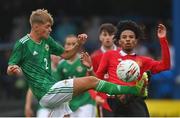 25 July 2022; Sean Brown of Northern Ireland in action against Ethan Williams of Manchester United during the SuperCupNI match between Northern Ireland and Manchester United at Coleraine Showgrounds in Coleraine, Derry. Photo by Ramsey Cardy/Sportsfile