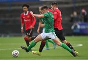 25 July 2022; Reece Jordan of Northern Ireland in action against Manni Norkett of Manchester United during the SuperCupNI match between Northern Ireland and Manchester United at Coleraine Showgrounds in Coleraine, Derry. Photo by Ramsey Cardy/Sportsfile