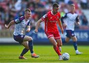 15 July 2022; Robbie Benson of Dundalk and Mark Doyle of St Patrick's Athletic during the SSE Airtricity League Premier Division match between St Patrick's Athletic and Dundalk at Richmond Park in Dublin. Photo by Ben McShane/Sportsfile