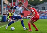 15 July 2022; Chris Forrester of St Patrick's Athletic and Daniel Kelly of Dundalk during the SSE Airtricity League Premier Division match between St Patrick's Athletic and Dundalk at Richmond Park in Dublin. Photo by Ben McShane/Sportsfile