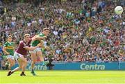 24 July 2022; Paudie Clifford of Kerry shoots at goal, despite the efforts of Jack Glynn of Galway during the GAA Football All-Ireland Senior Championship Final match between Kerry and Galway at Croke Park in Dublin. Photo by Ramsey Cardy/Sportsfile