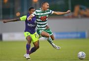 26 July 2022; Graham Burke of Shamrock Rovers is fouled by Rick of Ludogorets during the UEFA Champions League 2022-23 Second Qualifying Round Second Leg match between Shamrock Rovers and Ludogorets at Tallaght Stadium in Dublin. Photo by Ramsey Cardy/Sportsfile