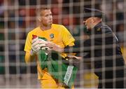 26 July 2022; Ludogorets goalkeeper Sergio Padt is escorted off the pitch by a member of An Garda Síochána after the UEFA Champions League 2022-23 Second Qualifying Round Second Leg match between Shamrock Rovers and Ludogorets at Tallaght Stadium in Dublin. Photo by Ramsey Cardy/Sportsfile