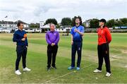 27 July 2022; George Dockrell of Leinster Lightning performs the coin toss alongside, from left, commentator Andrew Blair White of HBV Studios, umpire Jareth McCready and PJ Moor of Munster Reds before the Cricket Ireland Inter-Provincial Trophy match between Leinster Lightning and Munster Reds at Pembroke Cricket Club in Dublin. Photo by Piaras Ó Mídheach/Sportsfile