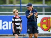27 July 2022; Coach Grainne Vaugh with a participant during the Bank of Ireland Leinster Rugby Summer Camp at Energia Park in Dublin. Photo by George Tewkesbury/Sportsfile