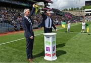 24 July 2022; Former Kerry footballers, and brothers, Mike, left, and Liam Hassett bring out the Sam Maguire Cup before the GAA Football All-Ireland Senior Championship Final match between Kerry and Galway at Croke Park in Dublin. Photo by Brendan Moran/Sportsfile