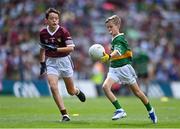 24 July 2022; Tom Mulconry, Beaumont Boys School, Blackrock, Cork, representing Kerry, in action against Devin De Burca, Gaelscoil Mhic Amhlaigh, Cnoc na Cathrach, Co. Gaillimh, representing Galway, during the INTO Cumann na mBunscol GAA Respect Exhibition Go Games at GAA All-Ireland Senior Football Championship Final match between Kerry and Galway at Croke Park in Dublin. Photo by Piaras Ó Mídheach/Sportsfile