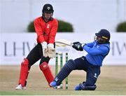 27 July 2022; Simi Singh of Leinster Lightning is bowled by Mike Frost of Munster Reds, not pictured, as wicketkeeper PJ Moor looks on, during the Cricket Ireland Inter-Provincial Trophy match between Leinster Lightning and Munster Reds at Pembroke Cricket Club in Dublin. Photo by Piaras Ó Mídheach/Sportsfile