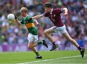 24 July 2022; Danann Glynn, Lisnagry N.S., Lisnagry, Limerick, representing Kerry, in action against Oran Kenny, St Saran's N.S., Belmont, Birr, Offaly, representing Galway, during the INTO Cumann na mBunscol GAA Respect Exhibition Go Games at GAA All-Ireland Senior Football Championship Final match between Kerry and Galway at Croke Park in Dublin. Photo by Piaras Ó Mídheach/Sportsfile