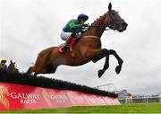 27 July 2022; Champ Kiely, with Paul Townend up, jumps the seventh on their way to winning the Tote Maiden Hurdle during day three of the Galway Races Summer Festival at Ballybrit Racecourse in Galway. Photo by Seb Daly/Sportsfile