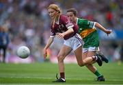 24 July 2022; Aine McCullagh, Queen of the Universe N.S., Bagenalstown, Carlow, representing Galway in action against Lily O’Riordan, Cullina N.S., Killarney, Kerry, representing Kerry during the INTO Cumann na mBunscol GAA Respect Exhibition Go Games at GAA All-Ireland Senior Football Championship Final match between Kerry and Galway at Croke Park in Dublin. Photo by Brendan Moran/Sportsfile