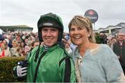 27 July 2022; Jockey Jordan Gainford and his mother Avril after riding Hewick to victory in the Tote Galway Plate during day three of the Galway Races Summer Festival at Ballybrit Racecourse in Galway. Photo by Seb Daly/Sportsfile