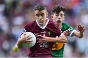 24 July 2022; Niall McConnon, St. Patrick's, Rathangan, Kildare, representing Galway, in action against Donnacha Malone, Scoil Mhuire, Glenties, Donegal, representing Kerry, during the INTO Cumann na mBunscol GAA Respect Exhibition Go Games at GAA All-Ireland Senior Football Championship Final match between Kerry and Galway at Croke Park in Dublin. Photo by Piaras Ó Mídheach/Sportsfile