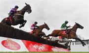 27 July 2022; Hewick, right, with Jordan Gainford up, jump the first on their way to winning the Tote Galway Plate during day three of the Galway Races Summer Festival at Ballybrit Racecourse in Galway. Photo by Seb Daly/Sportsfile