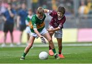 24 July 2022; Tadhg Ó hAisí, Gaelscoil Mhíchíl Cíosóg, Inis, Co. Chláir, representing Kerry, in action against Josh Furlong, Scoil Naomh Íosaf, Baltinglass, Wicklow, representing Galway, during the INTO Cumann na mBunscol GAA Respect Exhibition Go Games at GAA All-Ireland Senior Football Championship Final match between Kerry and Galway at Croke Park in Dublin. Photo by Piaras Ó Mídheach/Sportsfile