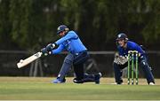 28 July 2022; Simi Singh of Leinster Lightning plays a shot watched by North West Warriors wicketkeeper Stephen Doheny during the Cricket Ireland Inter-Provincial Trophy match between Leinster Lightning and North West Warriors at Pembroke Cricket Club in Dublin. Photo by Sam Barnes/Sportsfile