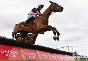 28 July 2022; Salvador Ziggy, with Davy Russell up, jumps the seventh on their way to winning the Guinness Novice Hurdle during day four of the Galway Races Summer Festival at Ballybrit Racecourse in Galway. Photo by Seb Daly/Sportsfile