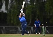 28 July 2022; Lorcan Tucker of Leinster Lightning is bowled by Shane Getkate of North West Warriors during the Cricket Ireland Inter-Provincial Trophy match between Leinster Lightning and North West Warriors at Pembroke Cricket Club in Dublin. Photo by Sam Barnes/Sportsfile