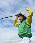28 July 2022; Jockey Liam McKenna celebrates after riding Tudor City to victory in the Guinness Galway Hurdle Handicap during day four of the Galway Races Summer Festival at Ballybrit Racecourse in Galway. Photo by Seb Daly/Sportsfile