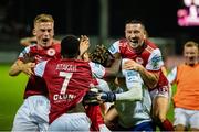 28 July 2022; St Patrick's Athletic players, including Serge Atakayi, 7, celebrate after their side's victory in a penalty shootout in the UEFA Europa Conference League 2022/23 Second Qualifying Round Second Leg match between Mura and St Patrick's Athletic at Mestni Stadion Fazanerija in Murska Sobota, Slovenia. Photo by Vid Ponikvar/Sportsfile