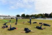 29 July 2022; North West Warriors players warm up before the Cricket Ireland Inter-Provincial Trophy match between North West Warriors and Munster Reds at Pembroke Cricket Club in Dublin. Photo by Sam Barnes/Sportsfile