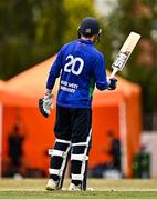 29 July 2022; Stephen Doheny of North West Warriors salutes his team-mates after bringing up his half century during the Cricket Ireland Inter-Provincial Trophy match between North West Warriors and Munster Reds at Pembroke Cricket Club in Dublin. Photo by Sam Barnes/Sportsfile