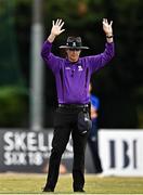 29 July 2022; Umpire Roly Black signals a six during the Cricket Ireland Inter-Provincial Trophy match between North West Warriors and Munster Reds at Pembroke Cricket Club in Dublin. Photo by Sam Barnes/Sportsfile