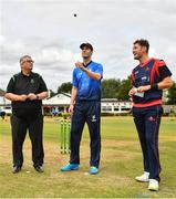 29 July 2022; Leinster Lightning captain George Dockrell makes the toss, watched by match referee Phil Thompson, left, and Northern Knights captain Mark Adair before the Cricket Ireland Inter-Provincial Trophy match between Northern Knights and Leinster Lightning at Pembroke Cricket Club in Dublin. Photo by Sam Barnes/Sportsfile