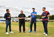 29 July 2022; Leinster Lightning captain George Dockrell makes the toss, watched by, from left, HBV studios commentator Andrew Blair White, Match Referee Phil Thompson and Northern Knights captain Mark Adair before the Cricket Ireland Inter-Provincial Trophy match between Northern Knights and Leinster Lightning at Pembroke Cricket Club in Dublin. Photo by Sam Barnes/Sportsfile
