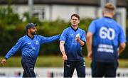 29 July 2022; Josh Little of Leinster Lightning, centre, is congratulated by team-mates Simi Singh, left, and Barry McCarthy after catching out  Mark Adair of Northern Knights during the Cricket Ireland Inter-Provincial Trophy match between Northern Knights and Leinster Lightning at Pembroke Cricket Club in Dublin. Photo by Sam Barnes/Sportsfile